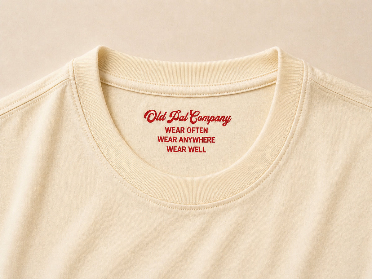 Close up of of old pal company inside neck print on aged white heavyweight cotton T-Shirt