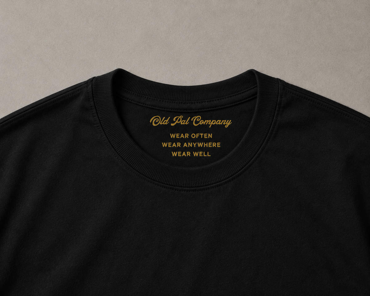 Close up of of old pal company inside neck print on Pitch Black heavyweight cotton T-Shirt